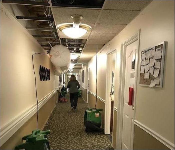 Air Movers and Dehumidification in commercial hallway