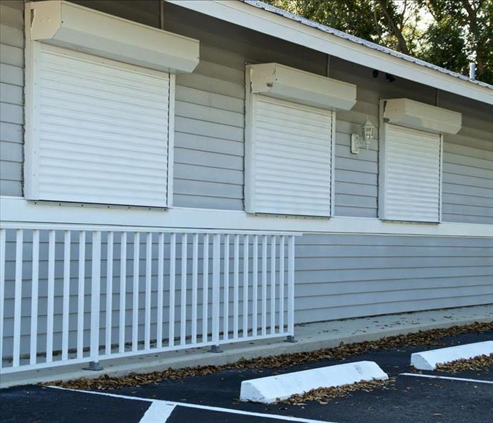 Image of a home with storm shutters installed